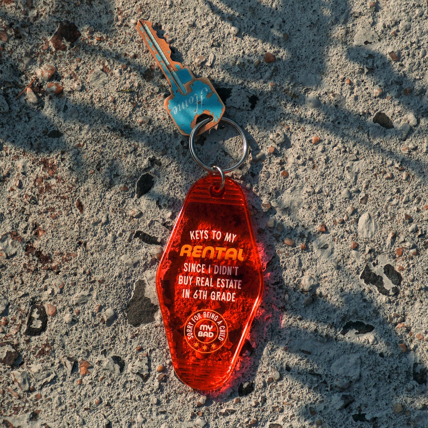I Still Rent Motel Keychain