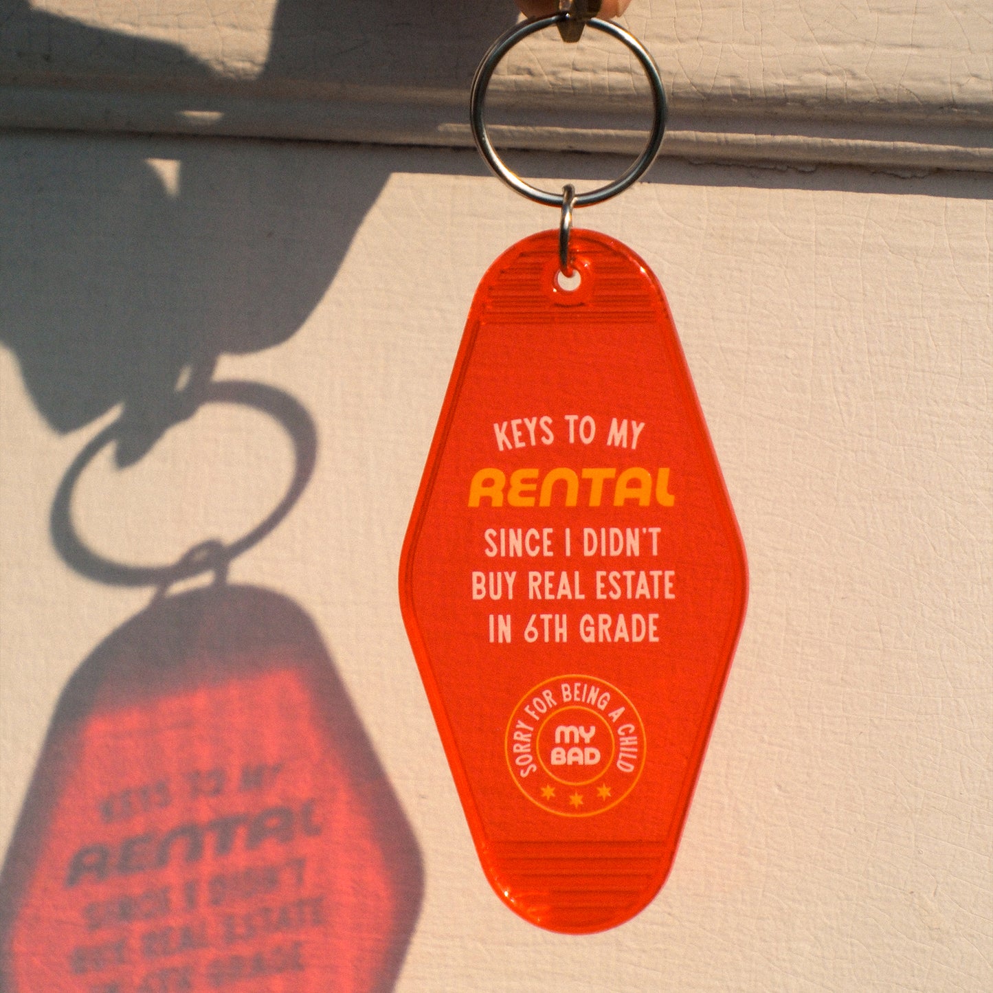 I Still Rent Motel Keychain